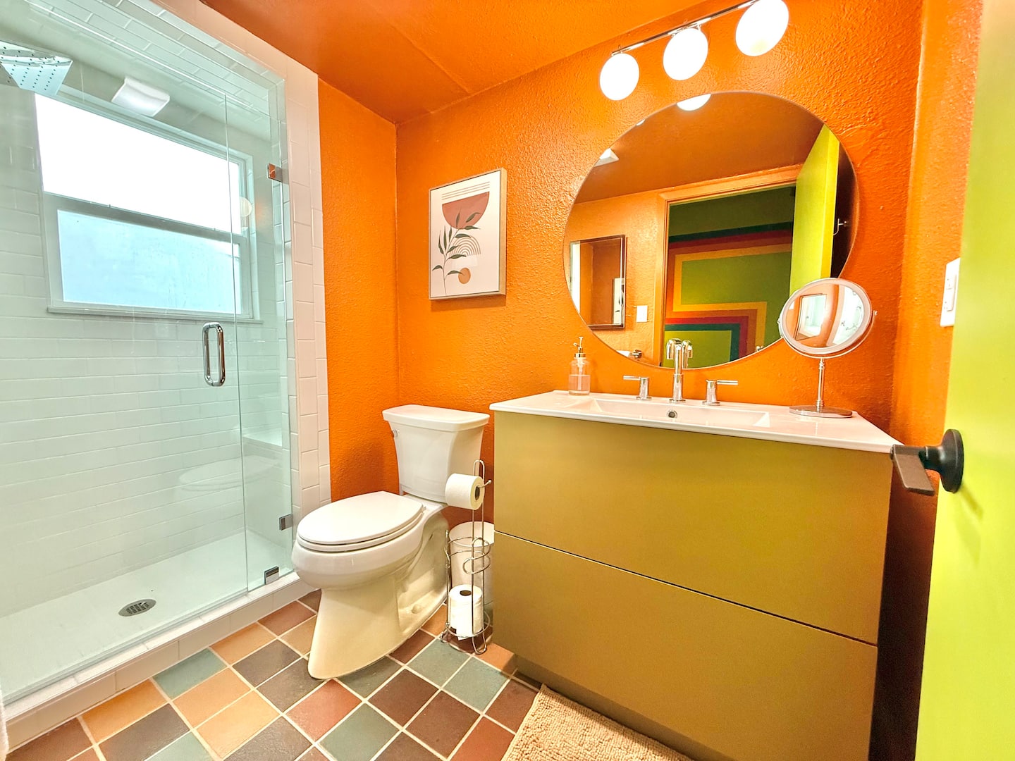 Orange en suite bathroom with a walk-in shower